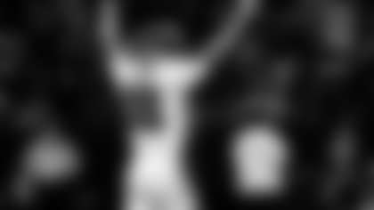 Atlanta Falcons quarterback Kirk Cousins (18) celebrates after a touchdown during an NFL football game against the New Orleans Saints, Sunday, Nov. 23, 2025, in New Orleans. (AP Photo/Tyler Kaufman)