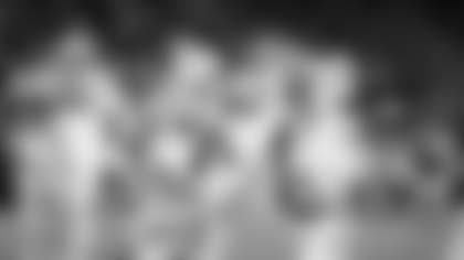 Green Bay Packers wide receiver Romeo Doubs (87) and quarterback Jordan Love (10) celebrate a touchdown during an NFL football game against the Seattle Seahawks, Sunday, Dec. 15, 2024 in Seattle. The Packers defeated the Seahawks 30-13. (AP Photo/Ben VanHouten)