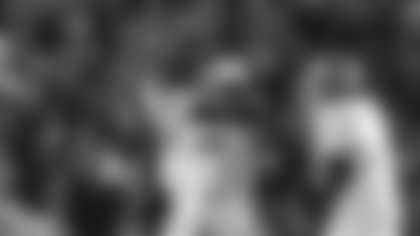 Mississippi quarterback Jaxson Dart (2) is consoled by offensive lineman Diego Pounds (61) after throwing an interception late in the second half of an NCAA college football game against Florida, Saturday, Nov. 23, 2024, in Gainesville, Fla. (AP Photo/Phelan M. Ebenhack)