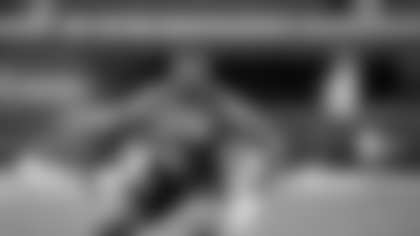 Kentucky linebacker Trevin Wallace runs a drill at the NFL football scouting combine, Thursday, Feb. 29, 2024, in Indianapolis. (AP Photo/Michael Conroy)