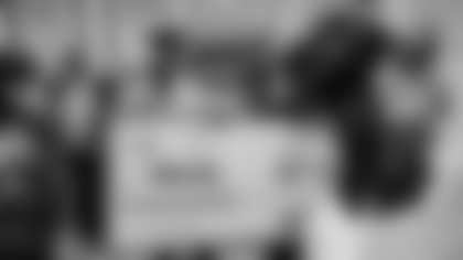 The Carolina Panthers surprise Changemaker nominee Michael DeVaul of the YMCA of the USA on Tuesday, No. 18, 2025 at Community Matters Cafe in Charlotte, NC.