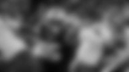 Carolina Panthers defensive tackle Derrick Brown (95) chases Tampa Bay Buccaneers quarterback Baker Mayfield (6) during the second half of an NFL football game, Sunday, Jan. 7, 2024, in Charlotte, N.C. (AP Photo/Rusty Jones)