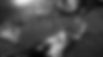 Carolina Panthers quarterback Cam Newton greets fans after the second half of an NFL football game against the Atlanta Falcons, Sunday, Dec. 28, 2014, in Atlanta. The Carolina Panthers won 34-3. (AP Photo/John Bazemore)