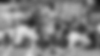 Indiana offensive lineman Kahlil Benson (67) defends against Miami defensive lineman Rueben Bain Jr. (4), center, as quarterback Fernando Mendoza (15) scrambles during the first half of a College Football Playoff national championship game, Monday, Jan. 19, 2026, in Miami Gardens, Fla. (AP Photo/Lynne Sladky)