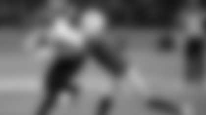 Atlanta Falcons wide receiver Drake London (5) is tackled by Indianapolis Colts cornerback Sauce Gardner (1) after catching a pass during the first half of an NFL football game, Sunday, Nov. 9, 2025, in Berlin, Germany. (AP Photo/Martin Meissner)