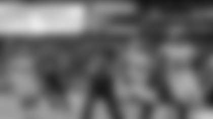 Seattle Seahawks running back Marshawn Lynch (24) arrives in the end zone with a 31-yard touchdown during the fourth quarter of an NFC divisional playoff NFL football game against the New Orleans Saints in Seattle, Saturday, Jan. 11, 2014. (AP Photo/John Froschauer)