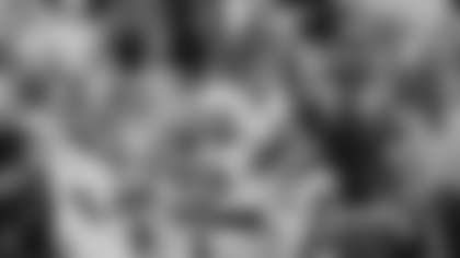 Georgia wide receiver Dillon Bell (86) celebrates a touchdown as he's lifted by offensive lineman Micah Morris (56) during the first half of an NCAA college football game against Tennessee, Saturday, Nov. 18, 2023, in Knoxville, Tenn. (AP Photo/Wade Payne)