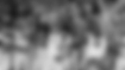 Tottenham's Son Heung-min holds the trophy aloft as he celebrates with teammates after winning the Europa League final soccer match against Manchester United at the San Mames Stadium in Bilbao, Spain, Wednesday, May 21, 2025.