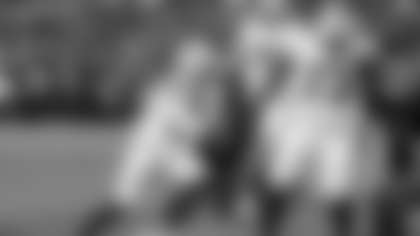 Buffalo Bills quarterback Josh Allen (17) gets a block from offensive tackle Dion Dawkins (73) as he runs past Tampa Bay Buccaneers defensive tackle Greg Gaines (96) for the second of three rushing touchdowns during an NFL football game, Sunday, Nov. 16, 2025 in Orchard Park, N.Y. (Paul Spinelli via AP)