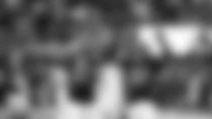 Atlanta Falcons defensive tackle Ruke Orhorhoro (98) celebrates his sack with linebacker James Pearce Jr. (27) in the first half of an NFL football game against the Los Angeles Rams, Monday, Dec. 29, 2025, in Atlanta. (AP Photo/Mike Stewart)