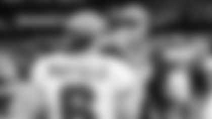 New Orleans Saints quarterback Tyler Shough (6), right, with Tampa Bay Buccaneer quarterback Baker Mayfield (6), left, post NFL football game, Sunday, Oct. 26, 2025, in New Orleans. (AP Photo/Ella Hall)