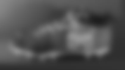 Jahlani Tavai's cleats supporting Team Impact.