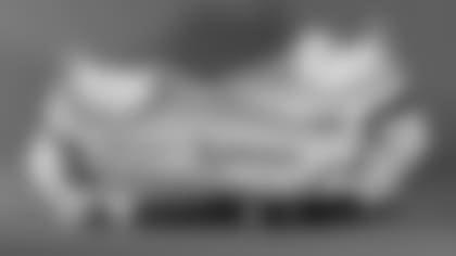 Darius Harris's cleats supporting Project Purple.