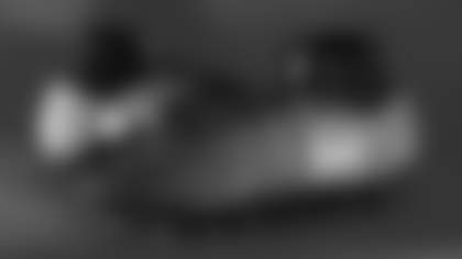 Andy Borregales cleats supporting Team Impact.