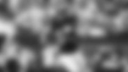 Los Angeles Rams quarterback Matthew Stafford completes a 24-yard pass to tight end Colby Parkinson against the Detroit Lions during their Week 15 matchup at SoFi Stadium.