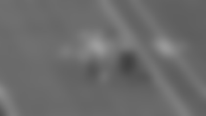 Los Angeles Rams wide receiver Puka Nacua makes a one-handed catch for 3 yards following a pass from quarterback Matthew Stafford against the Seattle Seahawks at Lumen Field during their NFC Championship matchup.