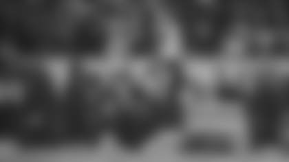 Los Angeles Rams inside linebacker Nate Landman and safety Kam Curl both penetrate the Chicago Bears offensive line for a fourth-down stop on Chicago Bears rookie running back Kyle Monangai.