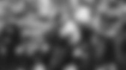 Los Angeles Rams running back Blake Corum rushes for 17 yards against the Arizona Cardinals during their Week 14 matchup at State Farm Stadium.