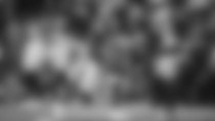 Los Angeles Rams quarterback Matthew Stafford heaves a 48-yard pass to wide receiver Xavier Smith against the Seattle Seahawks at Lumen Field.