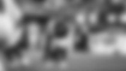 Los Angeles Rams quarterback Matthew Stafford completes a 37-yard pass to wide receiver Puka Nacua against the Detroit Lions at SoFi Stadium.