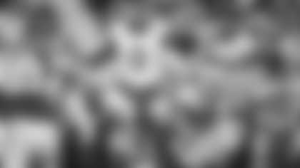 Los Angeles Rams outside linebacker Byron Young trips San Francisco 49ers running back Christian McCaffrey for a fourth-down stop at Levi's Stadium.