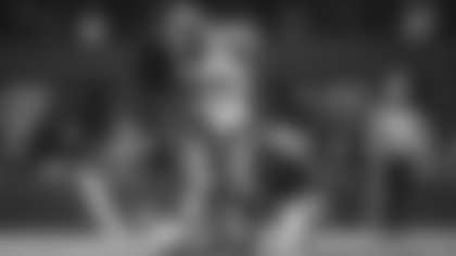 Los Angeles Rams wide receiver Puka Nacua leaps for an 18-yard snag against the Arizona Cardinals at State Farm Stadium.