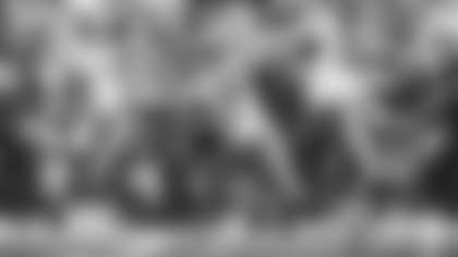 Los Angeles Rams running back Kyren Williams rushes for an 18-yard gain against the Arizona Cardinals at State Farm Stadium.