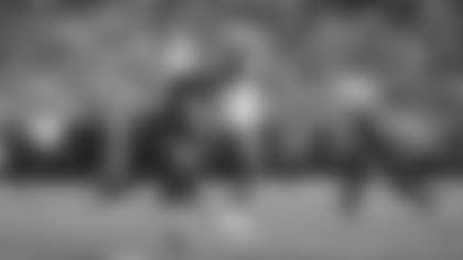 Los Angeles Rams wide receiver Puka Nacua uses one hand to collect a perfect 20-yard pass from quarterback Matthew Stafford in double coverage against the Arizona Cardinals at State Farm Stadium.