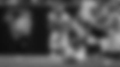 Los Angeles Rams running back Kyren Williams rushes for 15 yards against the Atlanta Falcons at Mercedes-Benz Stadium.