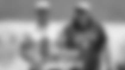 Steelers QB Aaron Rodgers (left) & Offensive Coordinator Arthur Smith (right)