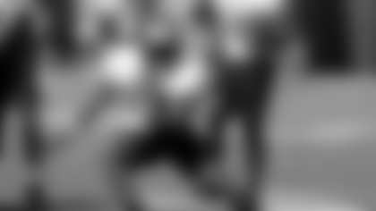 American running back Ray Davis of Kentucky (21) runs through drills during practice for the Senior Bowl NCAA college football game, Tuesday, Jan. 30, 2024, in Mobile, Ala. (AP Photo/ Butch Dill)