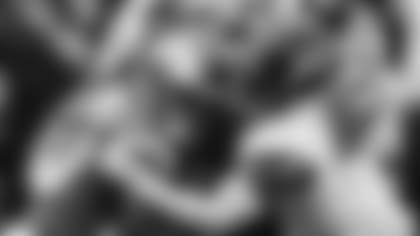 Los Angeles Rams running back Kyren Williams, left, is tackled by Washington Commanders linebacker Khaleke Hudson during the first half of an NFL football game Sunday, Dec. 17, 2023, in Inglewood, Calif. (AP Photo/Marcio Jose Sanchez)