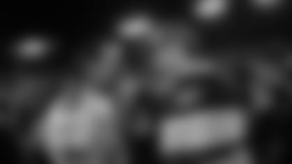 Green Bay Packers quarterback Aaron Rodgers (12) talks to New Orleans Saints quarterback Drew Brees after an NFL football game Thursday, Sept. 8, 2011, in Green Bay, Wis. The Packers won 42-34. (AP Photo/Morry Gash)