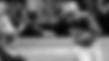 New Orleans Saints running back Pierre Thomas (23) rushes past Houston Texans linebacker Tim Dobbins (52) in the first half of an NFL preseason football game in New Orleans, Saturday, Aug. 25, 2012. (AP Photo/Bill Feig)