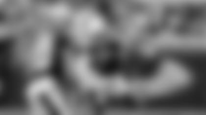 New Orleans Saints' Luke McCown (7) looks for an open receiver against the Carolina Panthers during the first half of an NFL football game in Charlotte, N.C., Sunday, Sept. 27, 2015. The Panthers won 27-22. (AP Photo/Bob Leverone)