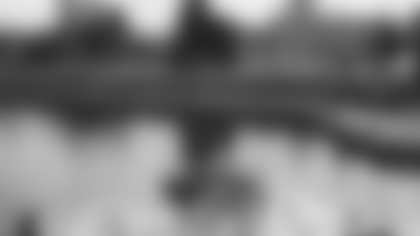 Canadian Seahawks fans onboard the Clipper V fast ferry, with Parliament in the background.