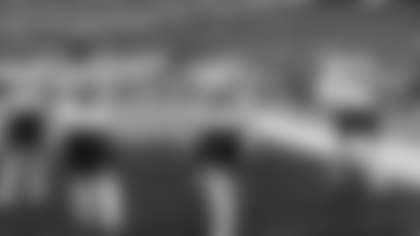 Seahawks defenders celebrate Julian Love's third quarter interception.