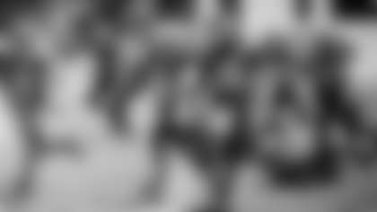 Elijah (36) and his brother, Santana (99) playing for the Troyanos (Trojans). (via Elijah's family)