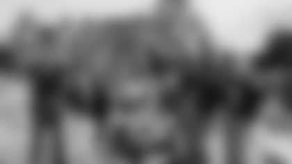 Canadian Seahawks fans onboard the Clipper V fast ferry, with the Fairmont Empress in the background.