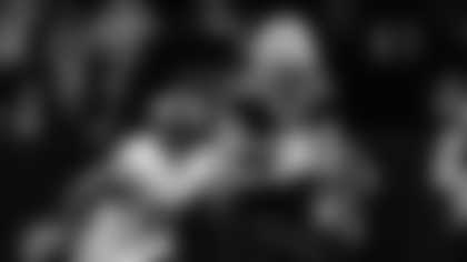 TE Foster Moreau (87) runs with the ball during the New Orleans Saints game against the Washington Commanders for Week 15 of the 2024 NFL Season on Dec. 15, 2024 at Caesars Superdome.