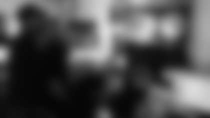 From left, Viz, Bighead Music Group co-founder Alex Loyalty and Tye Beats work on the final versions of Mack Wilson's songs at a local studio.