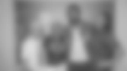 Ruben Hyppolite II with his grandmother, mother and sister