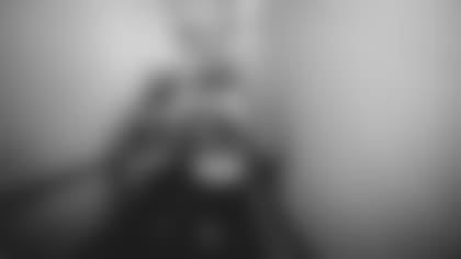 Kuechly in Packers vistor tunnel