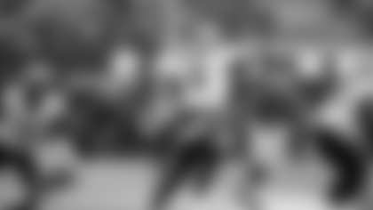 New Orleans Saints quarterback Tyler Shough (6) is pressured by Los Angeles Rams safety Kam Curl (3) as he throws a pass during an NFL football game, Sunday, Nov. 2, 2025 in Inglewood, Calif. (Paul Spinelli via AP)