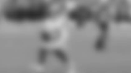 San Francisco 49ers quarterback Brock Purdy (13) rolls out to pass against the Arizona Cardinals during the second half of an NFL football game in Glendale, Ariz., Sunday, Nov. 16, 2025. (AP Photo/Ross D. Franklin)