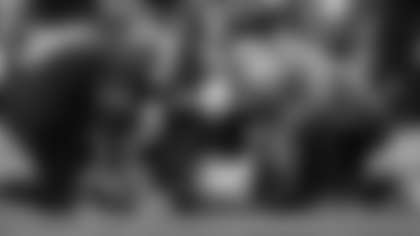 The Atlanta Falcons training staff tends to quarterback Michael Penix Jr. (9) during the second half of an NFL football game against the Carolina Panthers, Sunday, Nov. 16, 2025, in Atlanta. (AP Photo/Danny Karnik)