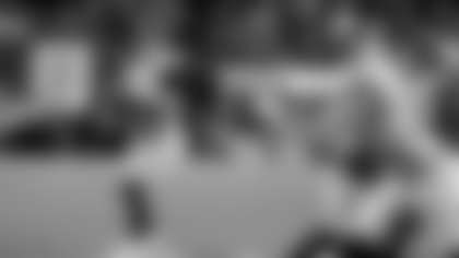 Seattle Seahawks quarterback Sam Darnold (14) looks to pass the ball to tight end Eric Saubert (81) during an NFL football game against the Los Angeles Rams, Thursday, Dec. 18, 2025 in Seattle. (AP Photo/Ben VanHouten)