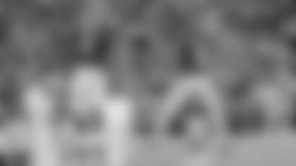 Alabama quarterback Jalen Milroe (4) and Alabama quarterback Bryce Young (9) celebrate after Young's touchdown run during the first half of an NCAA college football game against Auburn, Saturday, Nov. 26, 2022, in Tuscaloosa, Ala. (AP Photo/Vasha Hunt)