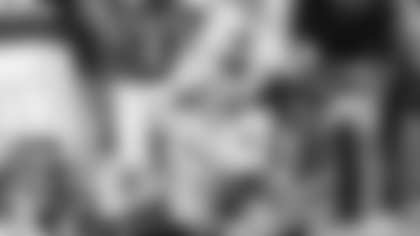 Indiana quarterback Fernando Mendoza is sacked by Miami defensive lineman Rueben Bain Jr. during the second half of the College Football Playoff national championship game, Monday, Jan. 19, 2026, in Miami Gardens, Fla.(AP Photo/Marta Lavandier)