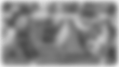 Quarterback Trey Lance completes a 28-yard pass to tight end Oronde Gadsden II.